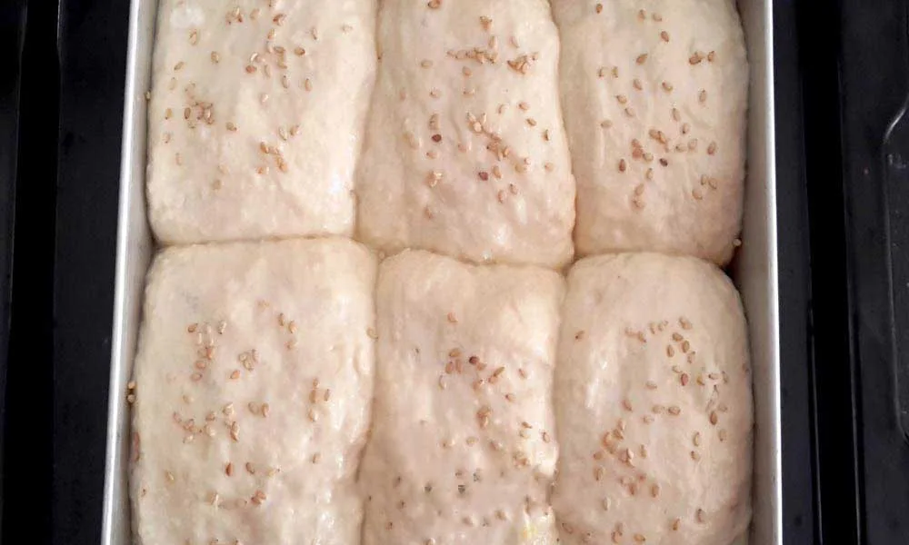 Stuffed-Dinner-Roll-ready-with-sesame-seed