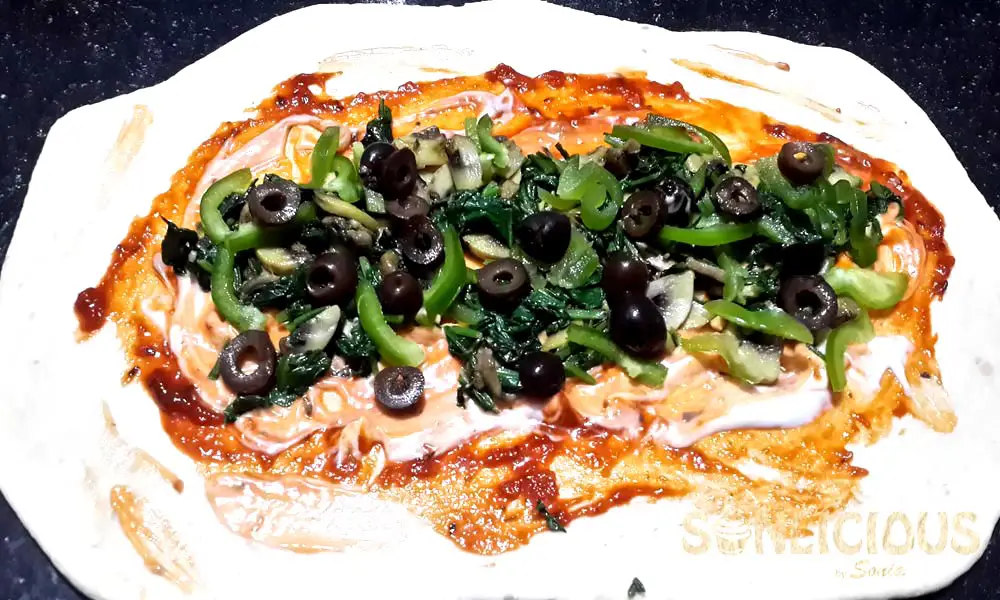 Pizza Sauce on dough sheet