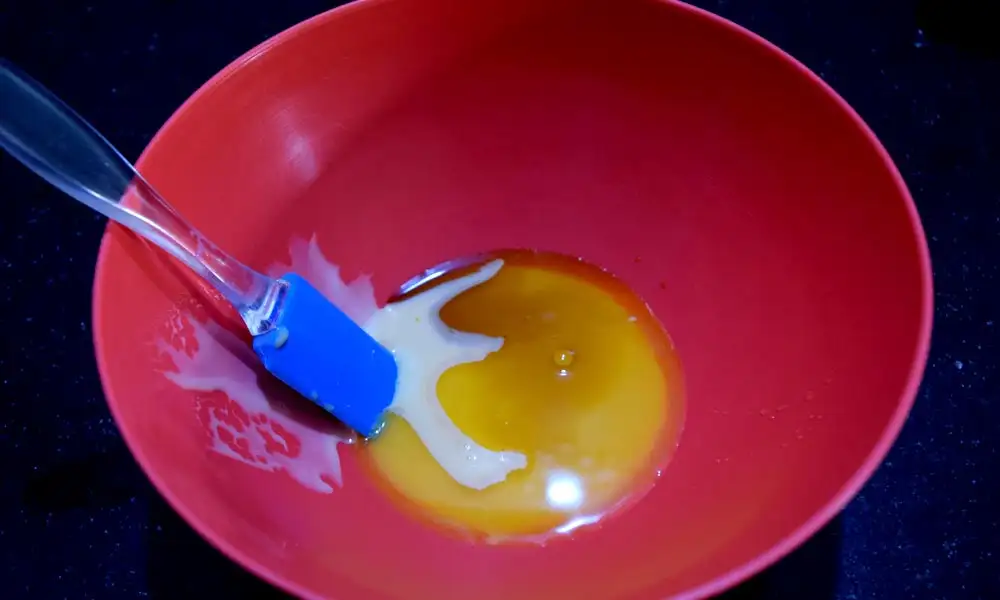Juice and condensed milk for Orange Cranberry Muffins